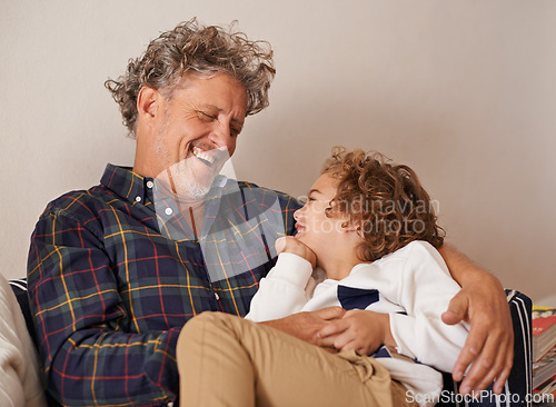 Image of Grandfather, boy and happy in home for bonding on break to relax, fun and enjoy school holiday. Man, grandson and excited with child for baby sitting, together and play in bedroom as family.