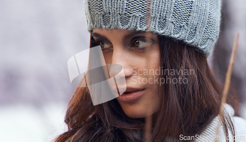 Image of Thinking, winter and face of woman outdoor for snowing season or weather on vacation. Travel, fashion and female person with beanie in nature with cold climate on style, adventure or weekend trip.