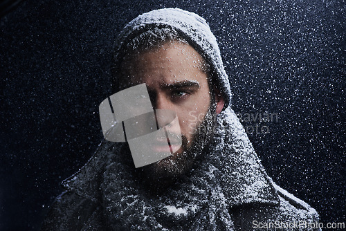 Image of Snow, night and man with portrait outdoor in winter with storm, ice and travel with fashion for cold climate. Cool, frost and male person in Iceland with adventure and freezing from weather in nature