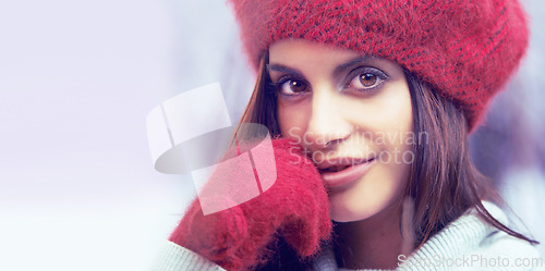 Image of Style, beauty and portrait of woman with winter clothes on cold weather vacation or holiday. Serious, makeup and face of female person with gloves and beanie for trendy fashion for weekend trip.