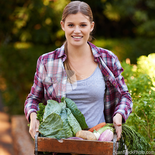 Image of Happy woman, portrait and harvest with vegetables, crops or resources in agriculture, growth or natural sustainability. Female person or farmer with smile, plants and organic veg for fresh produce