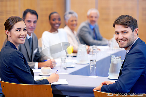 Image of Boardroom, portrait and employees with smile in meeting for business for discussion of stock market. Directors, women and male people in collaboration for strategy in sales, networking and talk