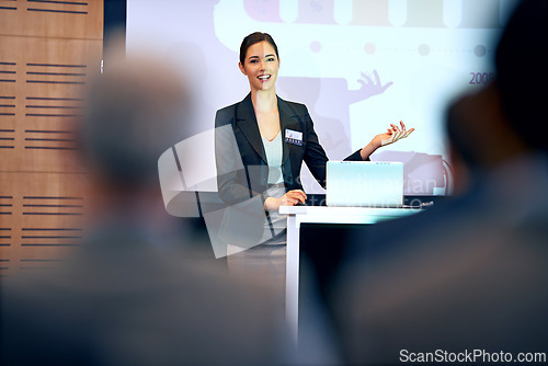 Image of Business woman, talking and presentation with projector screen, conference or workshop with laptop for slideshow. Corporate training, seminar and speaker with info, audience and professional speech