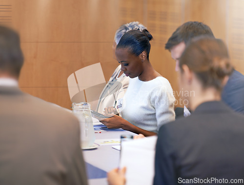 Image of Meeting, secretary and woman with tablet for notes in board room for discussion of stock market. Directors, women and male people in collaboration for strategy in sales and talk for report in job