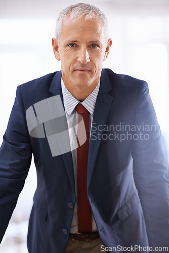 Image of Confidence, portrait and mature businessman, corporate ceo or senior manager at startup office. Opportunity, trust and face of business owner, boss or entrepreneur at professional agency with pride