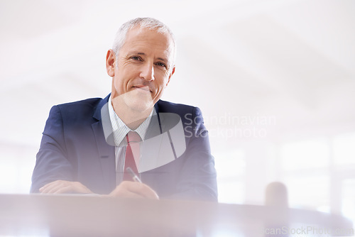 Image of Business, portrait and senior man writing in office for planning, brainstorming or mind map. Face, checklist and elderly male creative director with notes for project, proposal or startup management