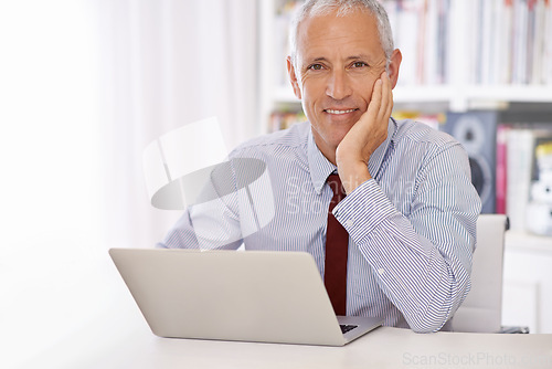 Image of Laptop, portrait and happy senior businessman in office planning or checking email, review or social media feedback. Face, smile or old male executive with pc for online, research or communication