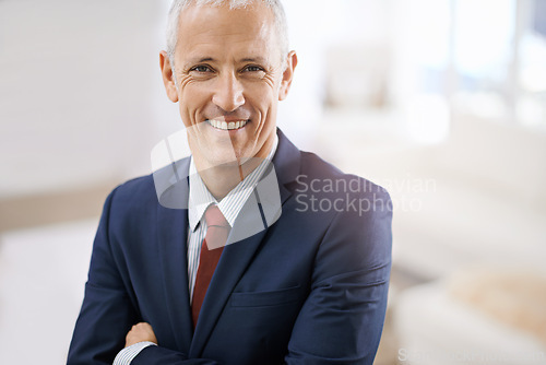 Image of Smile, portrait and mature businessman, professional or senior manager at corporate startup office. Arms crossed, confidence or happy face of business owner, boss or entrepreneur at agency with pride