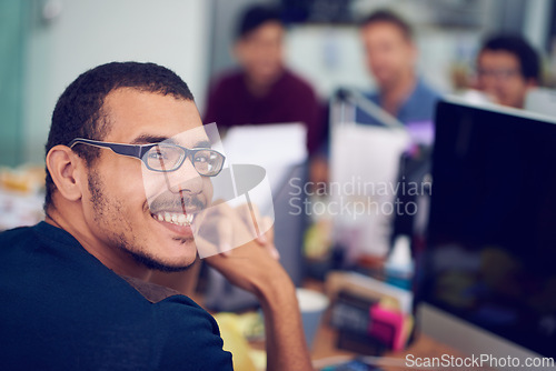 Image of Man, portrait and computer as programmer in office for software development, information technology or game design. Male person, glasses and face at desk for digital browsing, networking or website