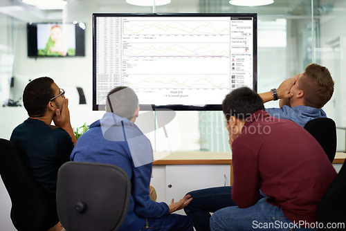 Image of Group, stress and men on computer in office reading coding data, information or research. Frustrated, technology and team of male programmers working on project with crisis on computer in workplace.