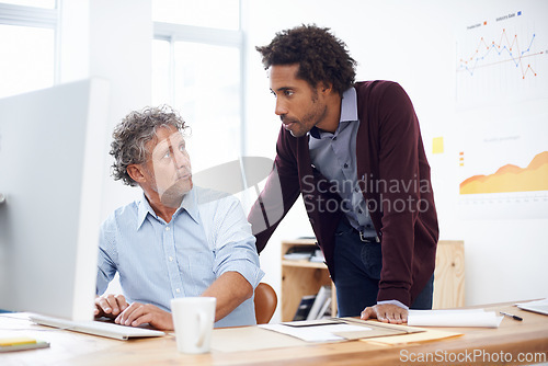 Image of Intern, mentor or employer in office with computer for internet, help or guide online in morning or indoor. Coworker, tech and desk with coffee for research, collaboration or career in company