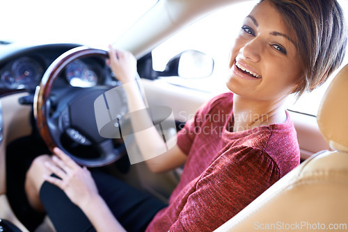 Image of Portrait, driving and business woman with travel on morning commute, road trip or journey to work. Smile, transport and happy driver at wheel of car with confidence, test drive and auto insurance.