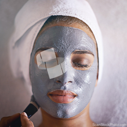 Image of Woman, mask and face in spa for skincare, wellness and cosmetic treatment for break or peace. Young person and natural for holistic therapy for facial, clean and hygiene with product for peel