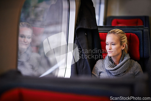 Image of Woman, travel and thinking on train for vacation with adventure, trip and leisure for journey in France. Female person, commute and holiday on public transport as tourist for break and destination