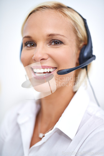 Image of Woman, smile and portrait in call center with mic for networking, telemarketing and contact at crm job. Person, happy and headphones with voip for communication, customer service or technical support