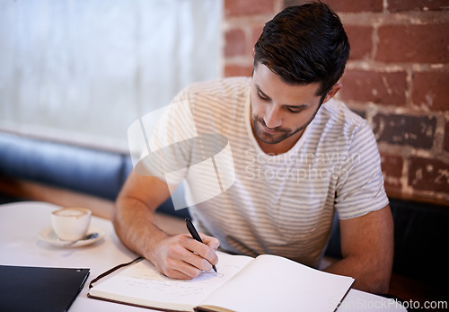 Image of Man, coffee shop and notebook for writing ideas, inspiration and writer for creativity in restaurant. Male person, journal and planning for story or author, calm and peace in cafe for script project