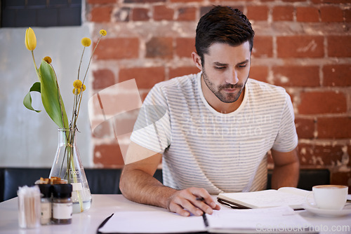 Image of Man, coffee shop and freelancer journal for writing, inspiration and writer for creativity in restaurant. Male person, journal and plan for story or author, calm and peace in cafe for script project