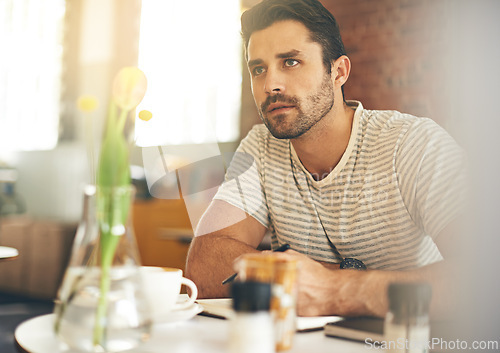 Image of Man, coffee shop and notebook for writing thoughts, inspiration and writer for creativity in restaurant. Male person, journal and plan for story or author, calm and ponder in cafe for script project