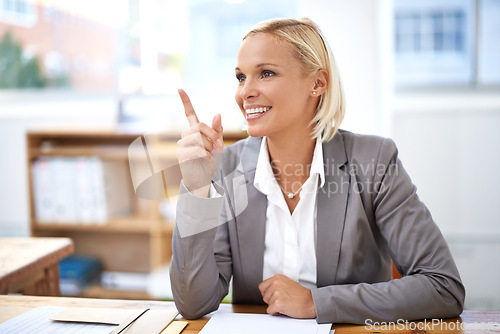 Image of Woman, happy and point with ideas at office desk in career at law firm for justice, crime or investigation. Lawyer, advocate or attorney with thinking, vision and smile for decision, evidence or case