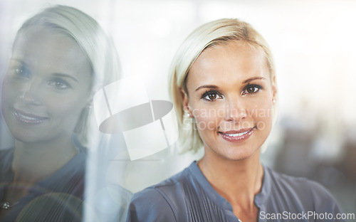 Image of Portrait, smile and woman at office window with confidence, opportunity and career in HR consulting business. Face, workplace and happy businesswoman with pride at professional human resources agency