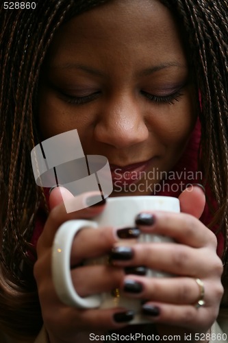 Image of white cup with black coffee