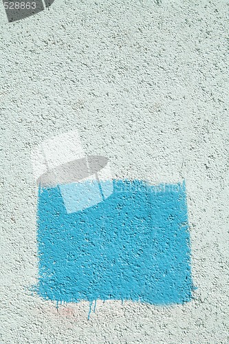 Image of concrete wall with blue rectangle