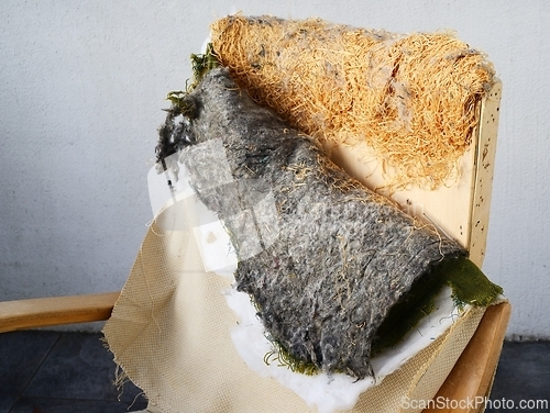 Image of armchair back with upholstery removed