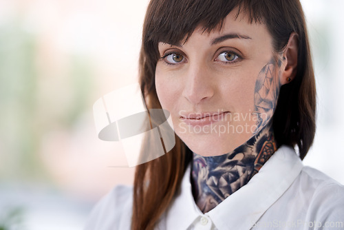 Image of Business, woman and tattoo with portrait in office with confident attitude, happiness or pride with mockup space. Entrepreneur, face of artist and designer with ink skin, body art or grunge aesthetic
