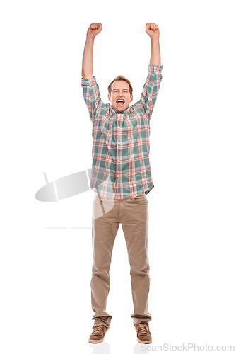 Image of Studio, portrait and man in celebration for winning the lottery, giveaway or achievement on white background. Happy, person or cheers for surprise success in gambling, competition or excited for news