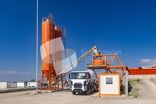Image of Vivid orange industrial cement plant