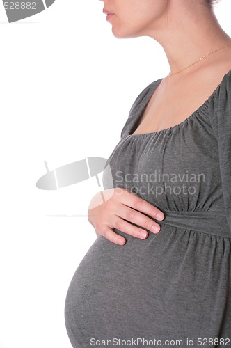 Image of expectant mother in knitted dress