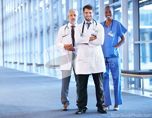 Image of Diversity, medical team and smile in hospital in confidence or committed with healthcare, wellness and teamwork. Portrait, clinic and doctor with nurse in happiness on group collaboration and work