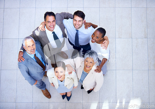 Image of Huddle, portrait and business people with smile in circle for support, solidarity and partnership. Employee, diversity and professional team with collaboration for meeting, trust and happy from above