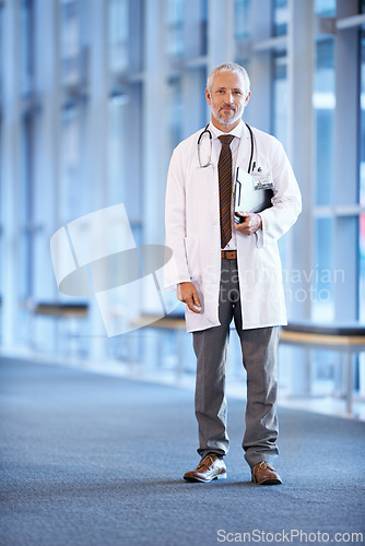 Image of Portrait, mature man and doctor with checklist in hospital for healthcare, wellness or service in Canada. Career, medical professional and surgeon with clipboard or expert in clinic on mockup space