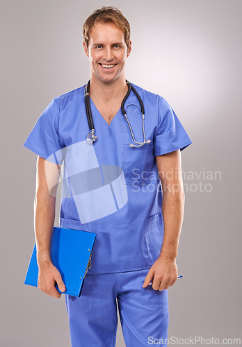 Image of Clipboard, doctor and portrait of man in studio for medical research, insurance and report for hospital. Healthcare, clinic and worker with documents for consulting and planning on gray background