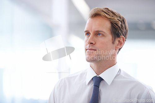 Image of Businessman, serious and thinking in the morning in office with corporate ideas, daydreaming and wondering. Entrepreneur, professional and thoughtful man at workplace with mockup space and confidence