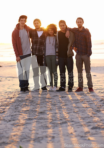 Image of Sand, support and portrait of friends at beach for sunset, summer adventure and bonding together. Nature, travel and people by ocean for weekend trip, holiday or vacation with wellness at seaside