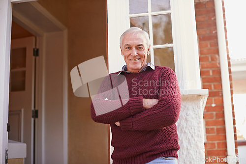 Image of Senior man, arms crossed and portrait on patio by front door to home in retirement, pride and smile. Elderly person, happy and outdoor with confidence by doorway to relax at house in Los Angeles