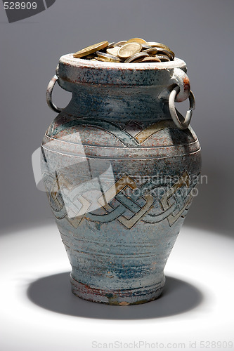 Image of ancient coins in antique pitcher, discovery