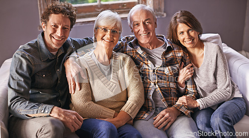 Image of Couple, senior parents and portrait on couch with smile, hug and care with bonding, relax and pride in home. Father, mother and happy with women, men and embrace with love on sofa in family house