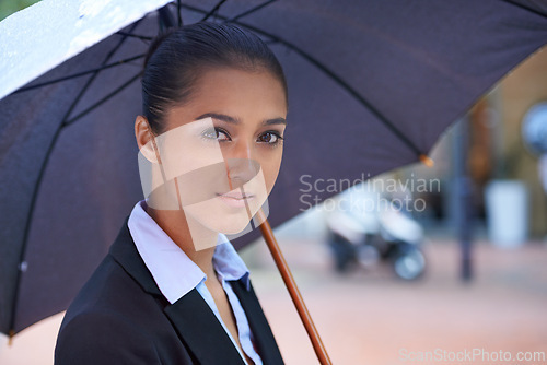 Image of Umbrella, travel or businesswoman in portrait or city for legal justice, commute and pride with protection. Outdoor, lawyer or face of female attorney, advocate or insurance advisor at courthouse