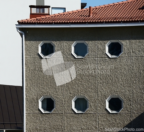 Image of house facade with octagonal windows