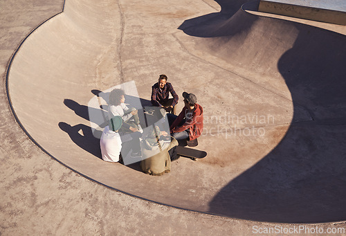 Image of Sunshine, skate park and friends with conversation, relax and communication with weekend break or group. People, outdoor or skaters with summer or recreation with diversity or support with discussion