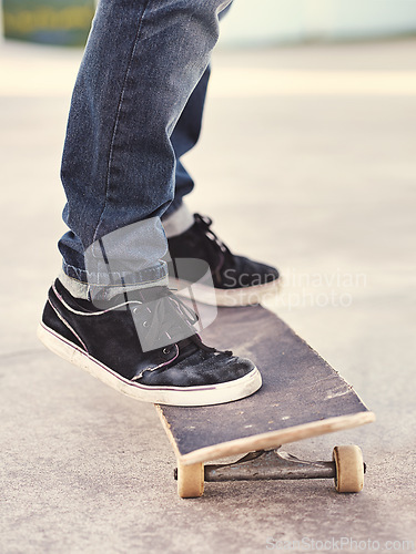 Image of Closeup, shoes and skateboard with energy, person and fitness with performance and hobby with skill. Skater, outdoor or summer with sneakers, cardio or sunshine with talent or balance with recreation