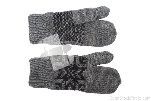 Image of wool gray knitted three-fingered gloves on a white 