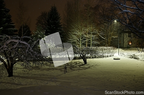 Image of snowy street of the small town of Pernio in Finland at night 