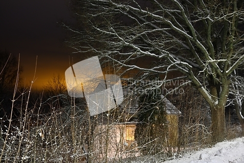 Image of snowy street of the small town of Pernio in Finland at night 