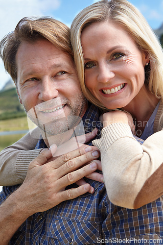 Image of Embrace, love and portrait of couple in nature in summer for vacation, holiday and bonding at countryside. Man, woman and smile with happiness weekend adventure, travel and tourism in Australia