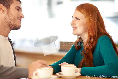 Image of Couple, smile and eye contact for love in coffee shop, support and happiness for peace in relationship. Adult, woman and girl together with man or partner in cafe, excited and marriage with guy