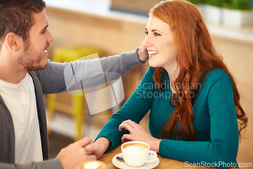 Image of Couple, man and woman holding hands in cafe for love, support and happiness for peace in relationship. Adult, male person and guy caress girl or partner with hand in coffee shop with smile and joy